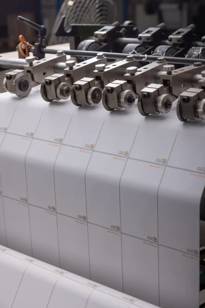 custom printed label web on slitting line