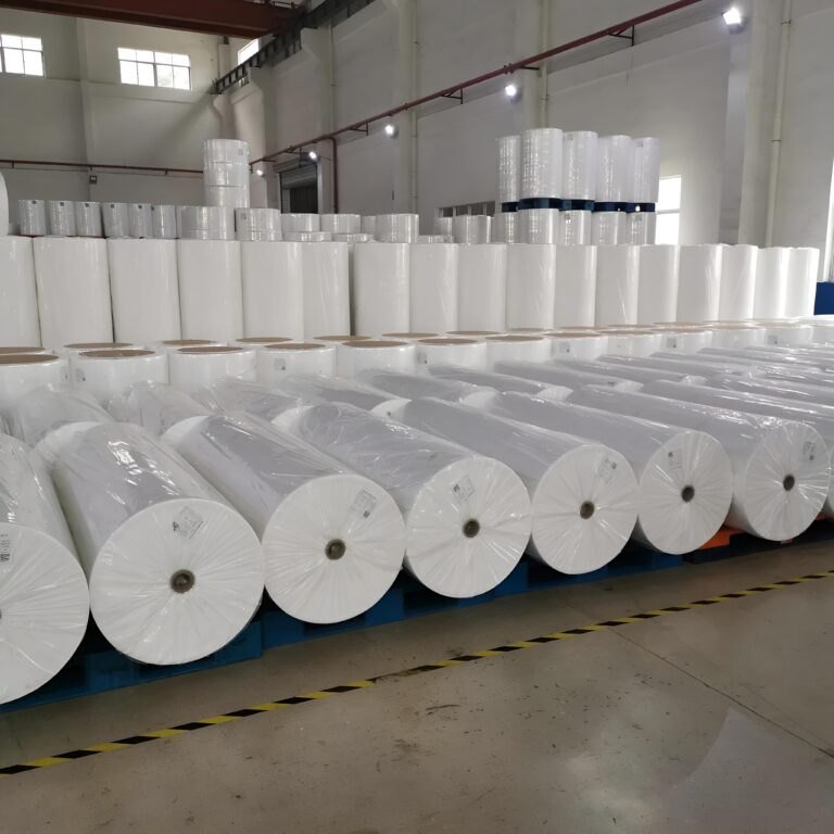 Factory roll stock material storage for packaging production