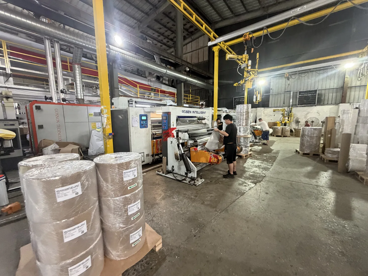 Production equipment and packed rolls in the factory workshop
