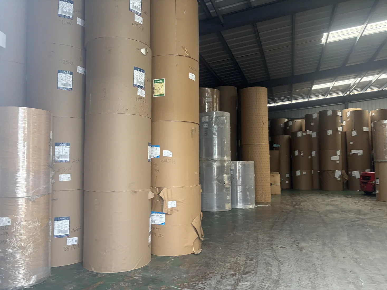Raw material jumbo rolls stored for thermal paper and packaging film production