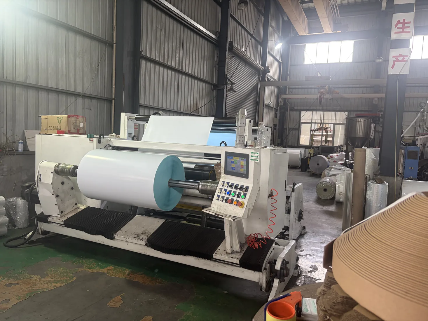 Slitting and rewinding equipment for roll material conversion